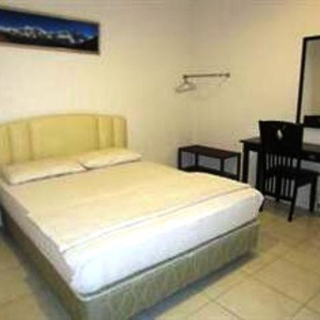 Mendu Inn Кучинг Номер фото