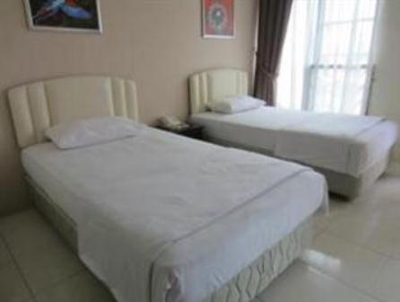 Mendu Inn Кучинг Номер фото